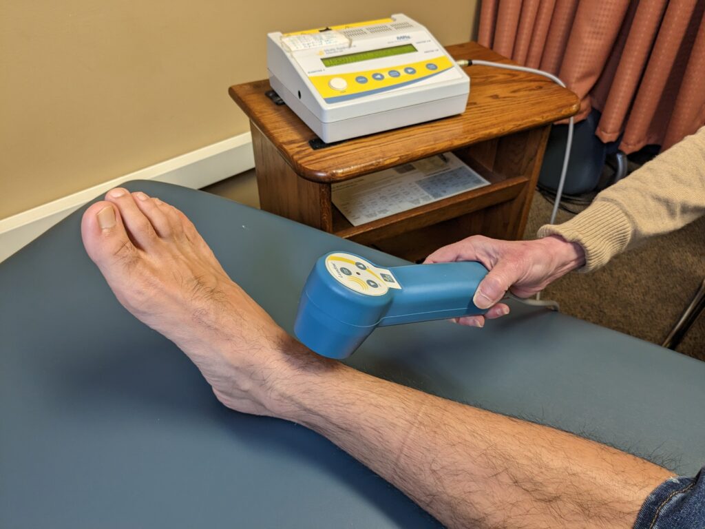 Low level cold laser therapy at Onion River Chiropractic via Multi Radiance Technology, utilizing the advanced MR4 machine